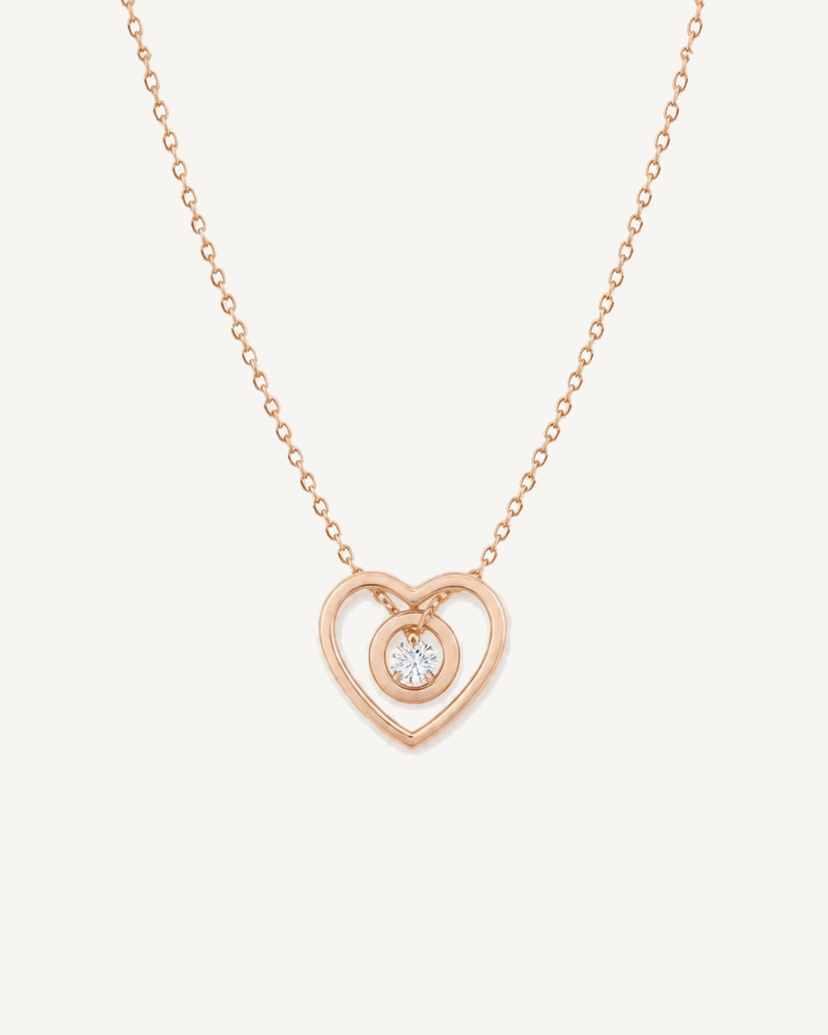 Rose gold heart pendant necklace with a round lab-grown diamond