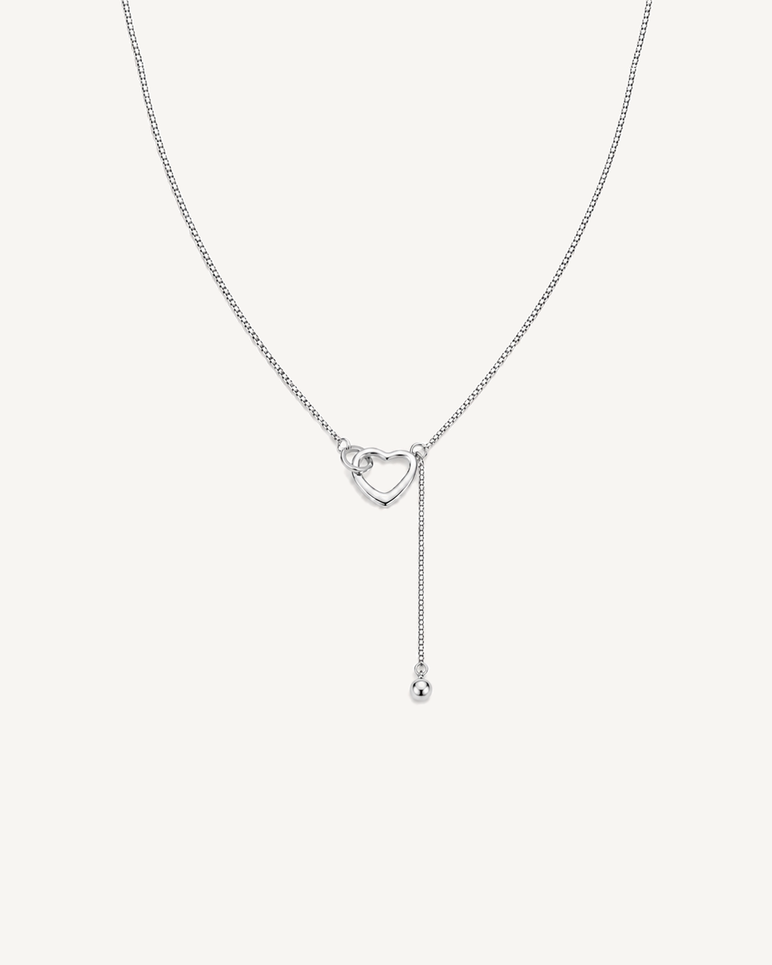 Heart Lariat Necklace product image on Oyster Silk background
