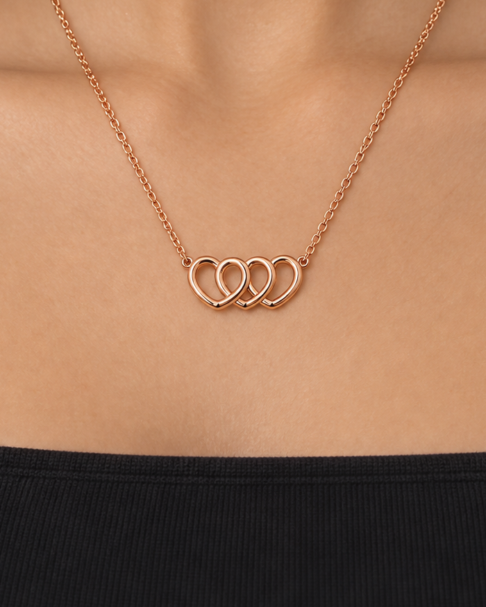 Interlocking Heart Necklace, close worn view