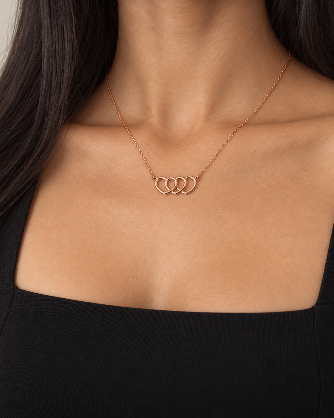 Interlocking Heart Necklace, farther worn view
