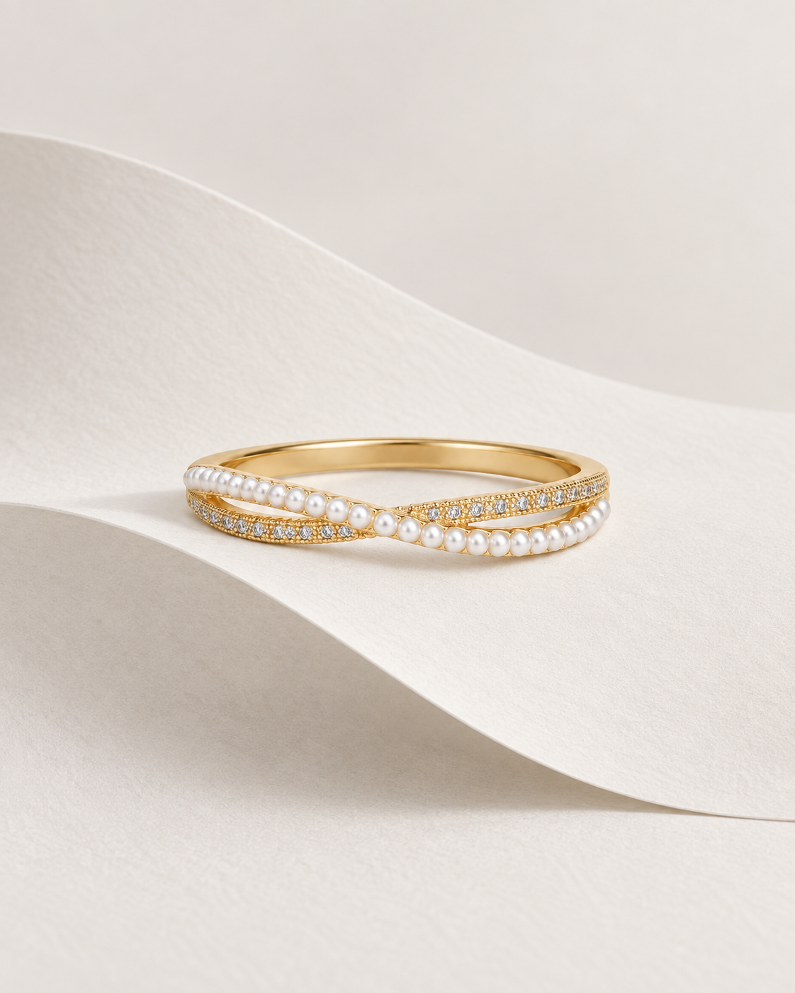 Crossed Wave Ring — Design-led creative