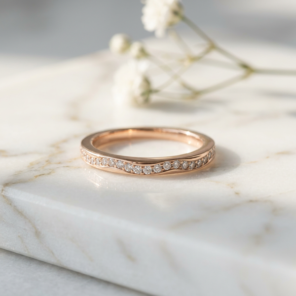 Slim rose gold wave band, a stackable ring for building an everyday ring stack