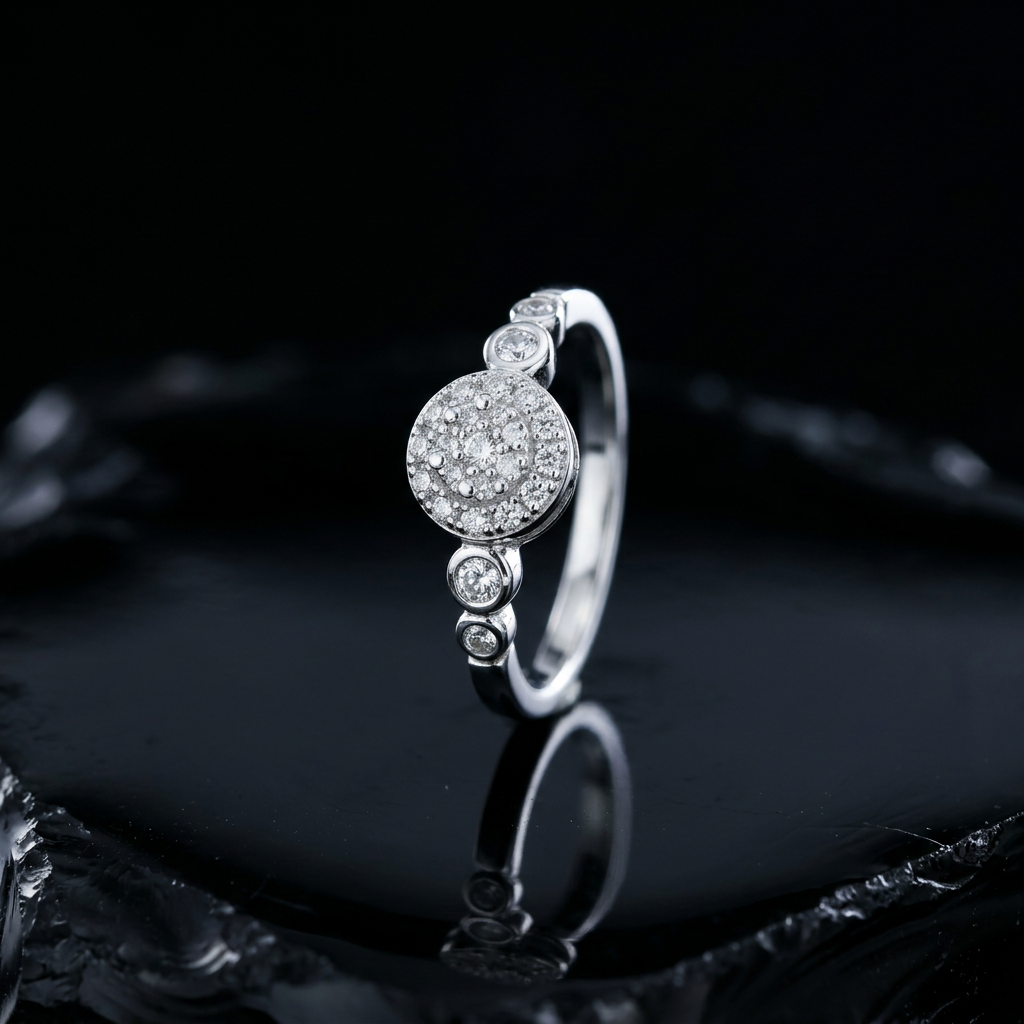 Silver pave cluster ring with graduated bezel settings, a secure setting for everyday diamond wear