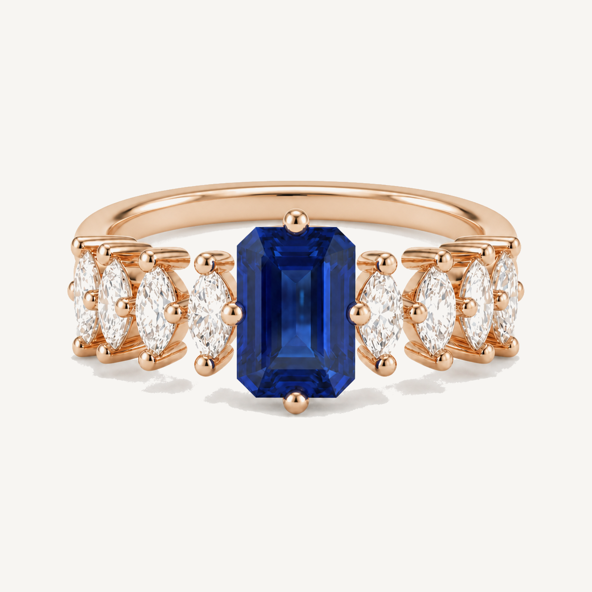 Fancy colour lab-grown diamonds: a blue step-cut semi-precious stone ring framed by white lab-grown diamonds in sterling silver.