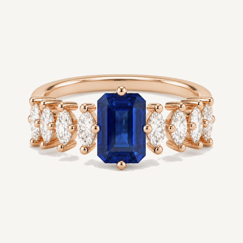 Fancy colour lab-grown diamonds: a blue step-cut semi-precious stone ring framed by white lab-grown diamonds in sterling silver.