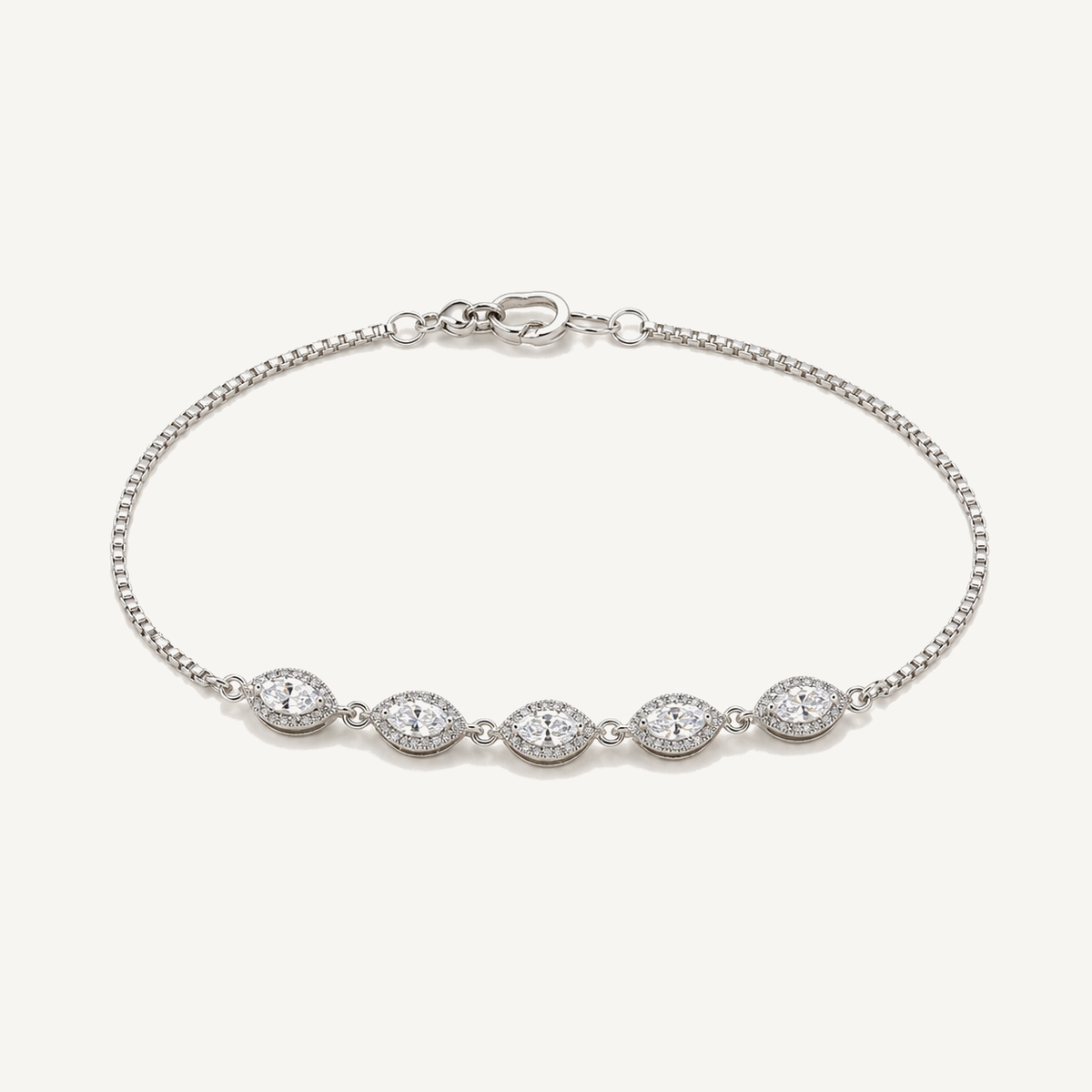 A slim sterling-silver diamond line bracelet, the lighter every day relative of a classic tennis bracelet.