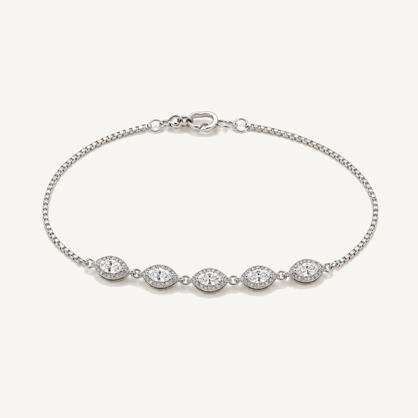 A slim sterling-silver diamond line bracelet, the lighter every day relative of a classic tennis bracelet.