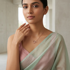 An architectural open pendant in rose gold with fine pavé details, suspended elegantly from a classic box chain for women.
