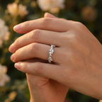 Close-up of a model wearing a fine sculptural crystal cluster ring with an asymmetric modern constellation look.