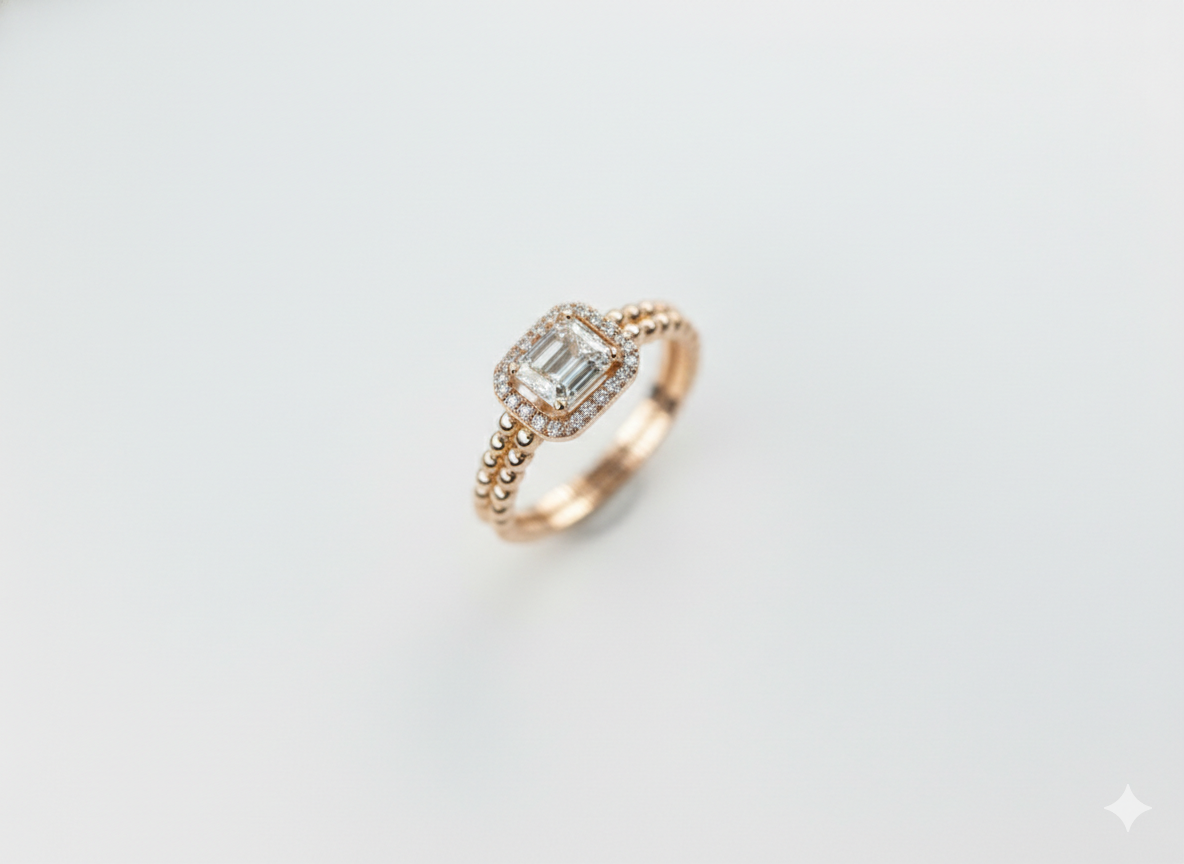Symmetrical overhead view of a flawless E-F color VVS clarity lab grown diamond emerald cut halo ring.