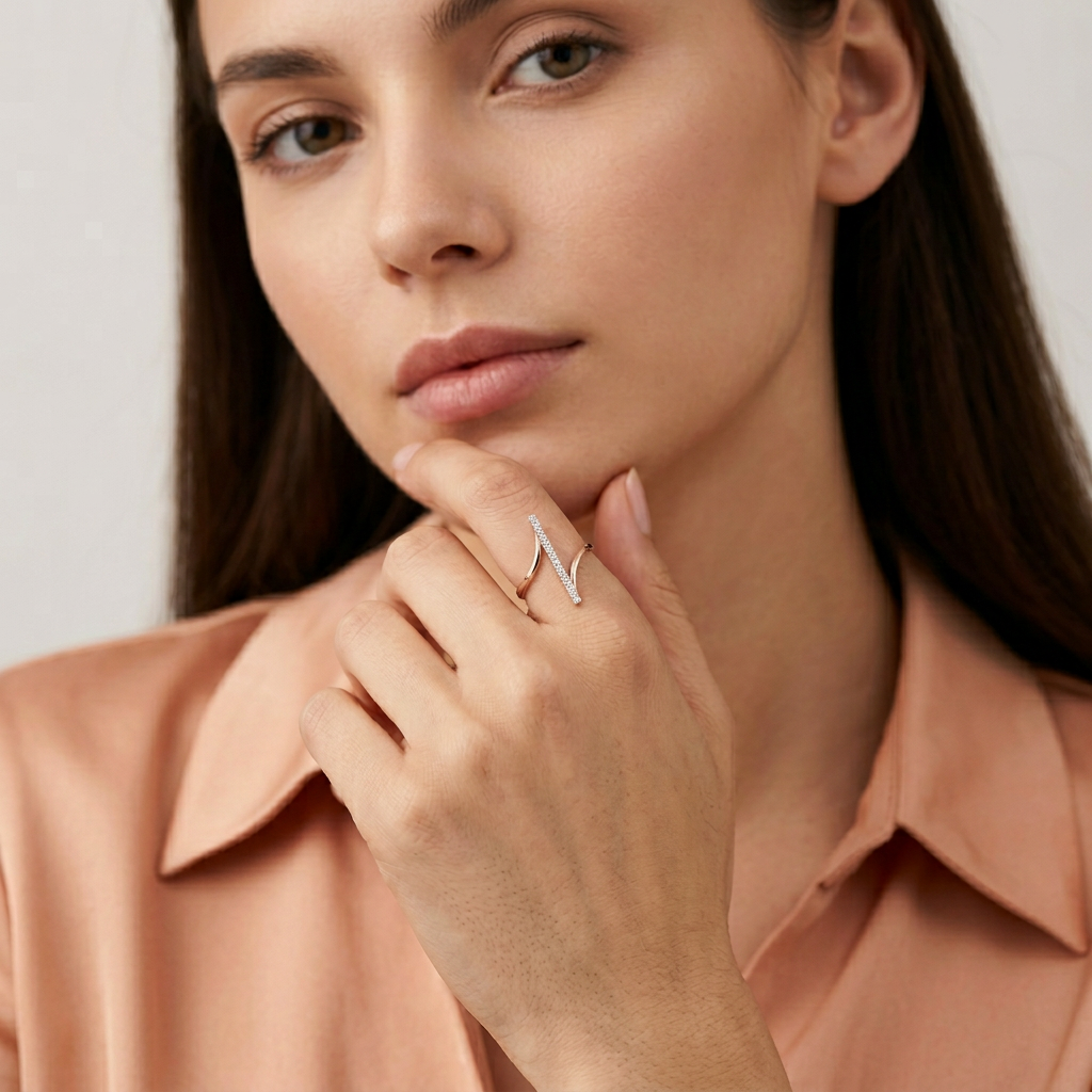 A bold kinetic axis ring styled neatly between thick, square-edged solid gold stacking bands.