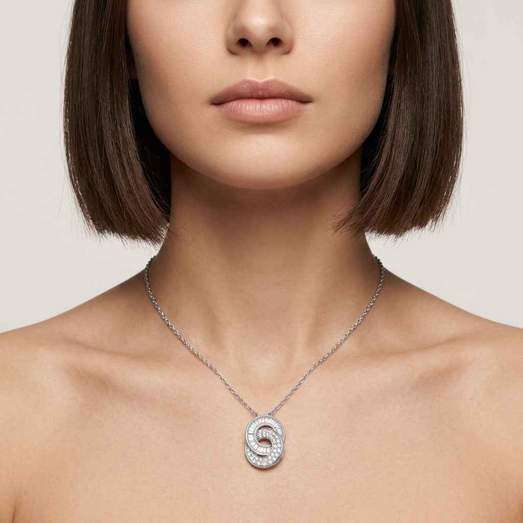 Women wearing the Infinite Medallion pendant necklace showcasing the fine architectural geometry, sharp baguette-cut stones, and pave-set lab grown diamonds.
