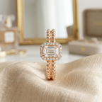 A stunning 1.9 carat emerald cut halo ring with a delicate diamond border and a textured double beaded band.