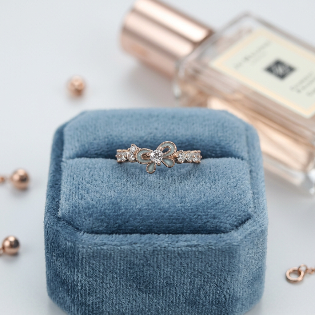 Editorial shot of a woman wearing a modern gold ribbon ring accented with a brilliant blue cerulean gemstone.