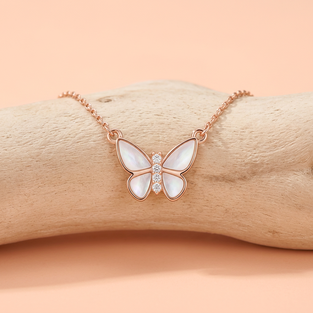 A delicate butterfly necklace with lustrous pearls and fine pavé details, styled for a luxury daily look.