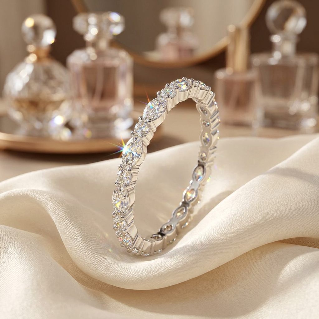 Close-up of high-shine silver architecture featuring a precise sequence of marquise and round-cut stones.