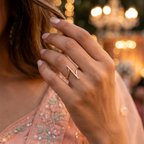 A polished gold geometric kinetic band, perfect as an upscale contemporary design ring gift for her.