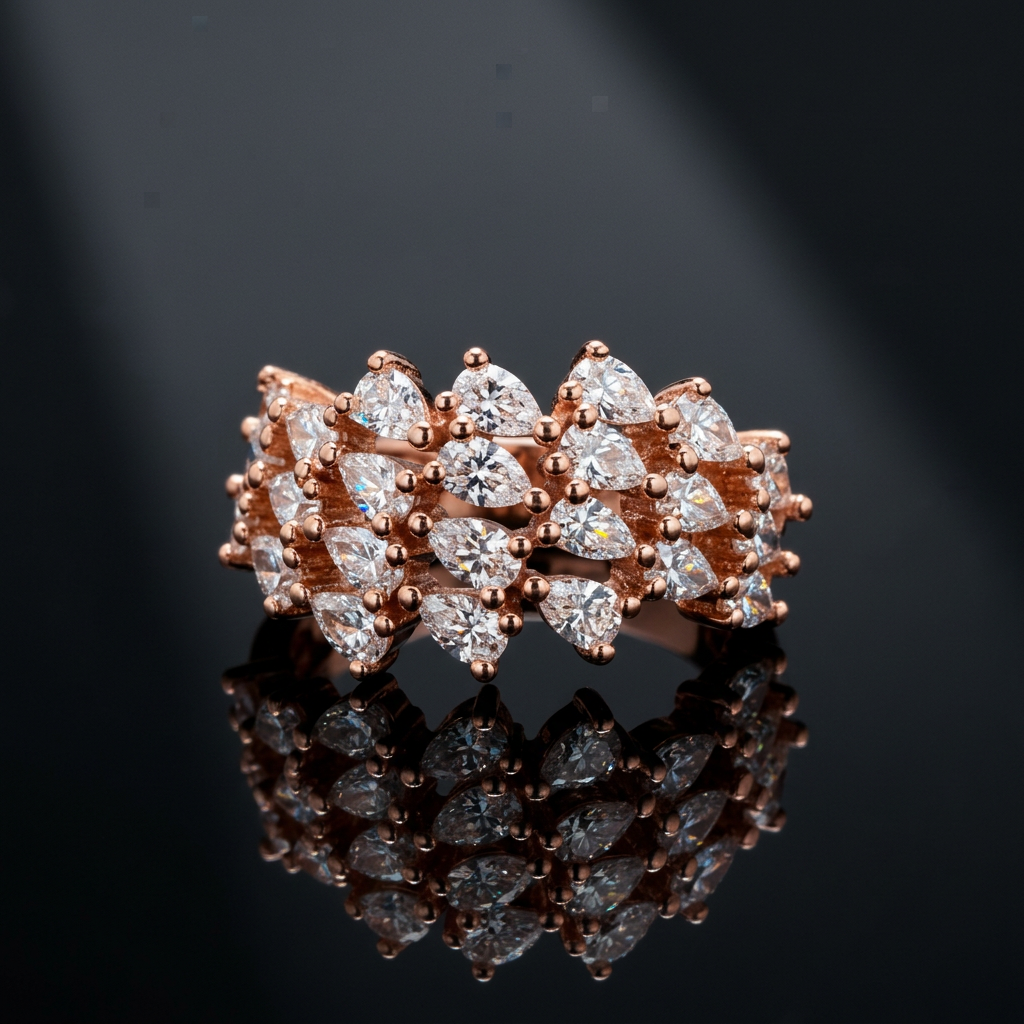 Editorial shot of a modern rose gold floral cluster ring designed with marquise and pear gems.