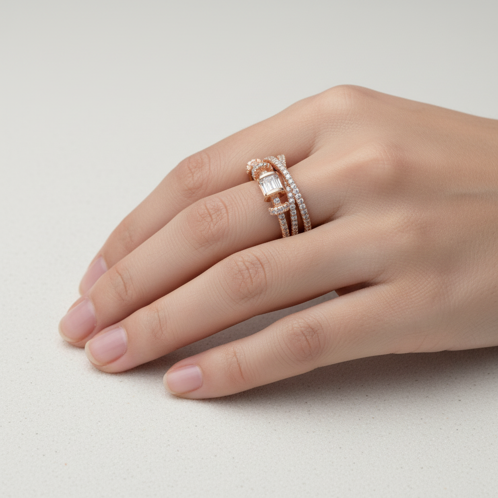A detailed close-up showing a multi layered statement ring design featuring sculptural sweeping lines intricately set with brilliant pavé lab grown diamonds anchoring a striking step cut stone.