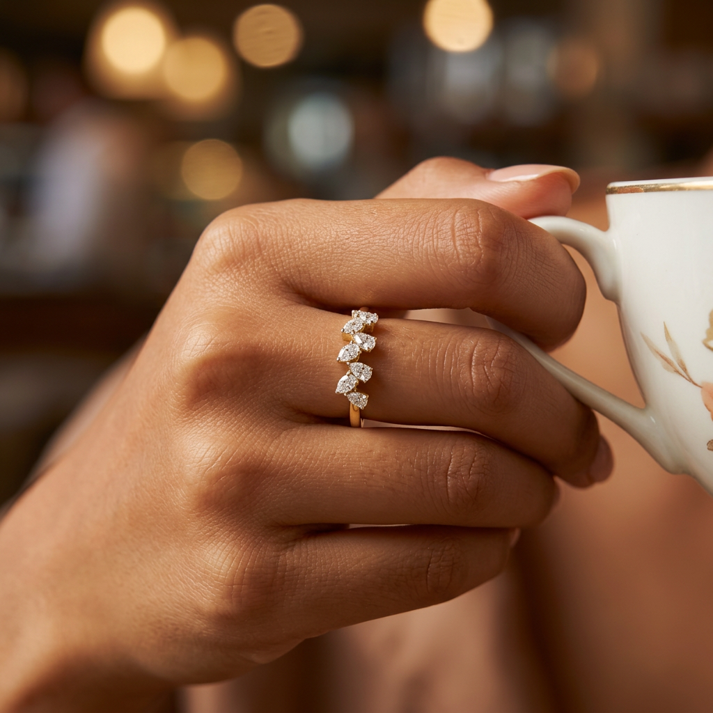 Front view of a yellow gold cluster ring showcasing an organic, jagged silhouette set with radiant diamonds.