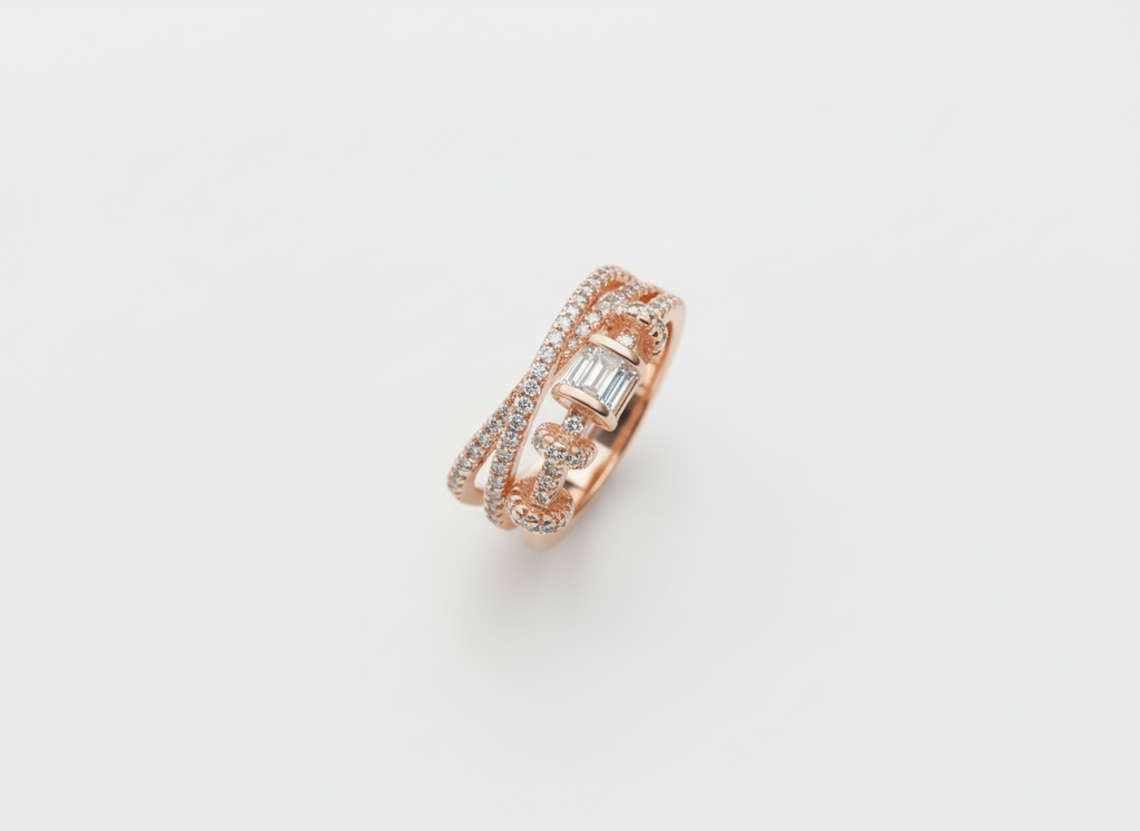 A high-resolution product shot showcasing the fine details of a multi-layered ring, highlighting a prominent precision step cut centerpiece accented by sweeping lines of radiant pavé lab grown diamonds.