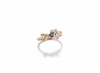 A curated hand stack matching an asymmetric blue gemstone cluster ring with plain rose gold companion bands.