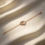 A delicate rose gold interlocking circle bracelet featuring white pavé stones on a fine cable chain.