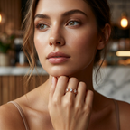 Side profile highlighting the sharp, contemporary geometry and raised architectural borders of a rose gold ring.