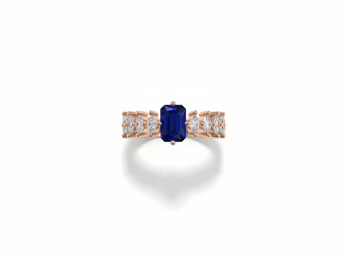 Side view displaying the tiered rose gold setting and deep hue of an indigo emerald cut gem evening ring.