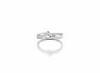 Side profile view displaying the fluid, interlocked open architecture and structural layers of a silver multi band knot ring.