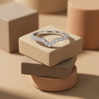 A sparkling silver chevron ring guard band framing a classic solitaire ring to showcase its contour stacking capability.