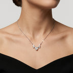 sterling silver necklace for women featuring a 1.4 carat heart cut center stone and brilliant accent diamonds.