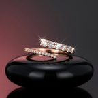 High polish yellow gold open ring featuring a fluid bypass design set with pave and graduated round-cut diamonds.
