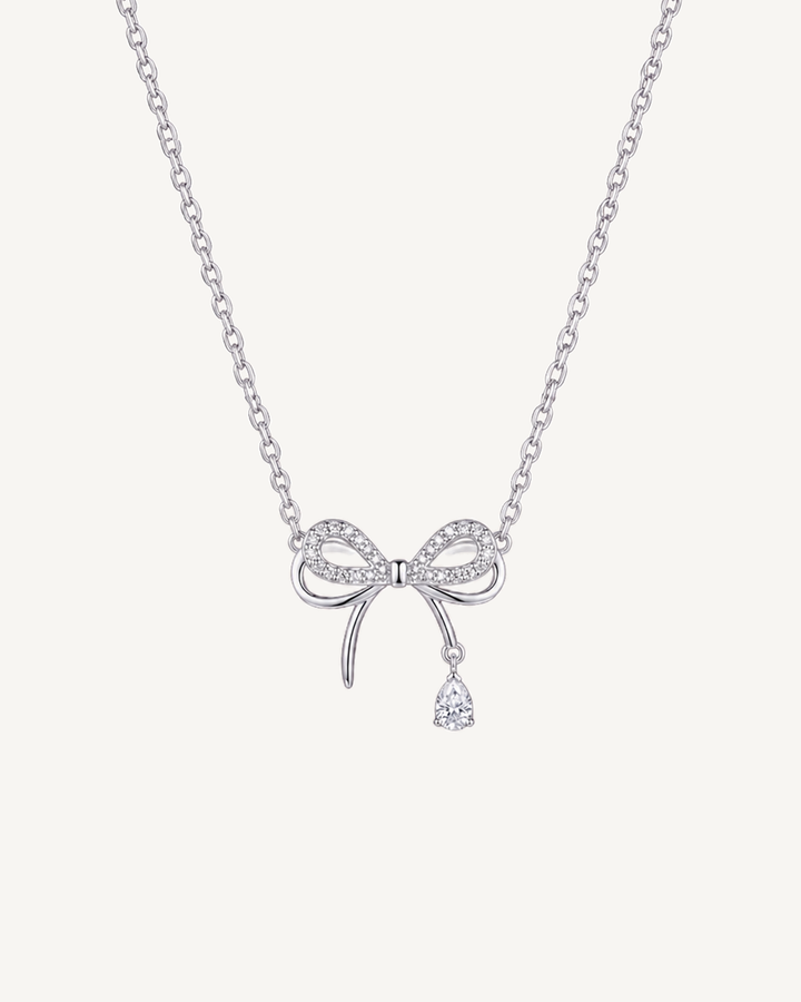Bow Tassel Necklace product image on Oyster Silk background