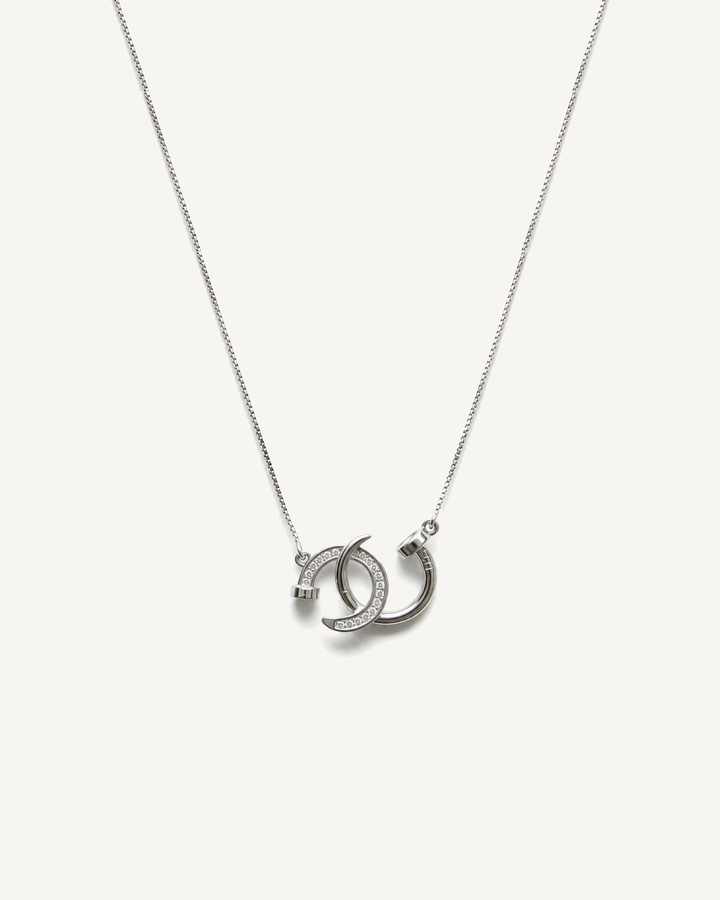 Crescent Interlock Necklace product image on Oyster Silk background