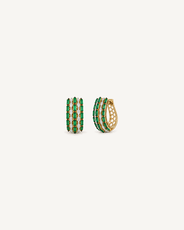 Green Baguette Hoops in Yellow Gold, left hoop front-facing and right hoop angled, with three green stone columns alternating with two white diamond columns.