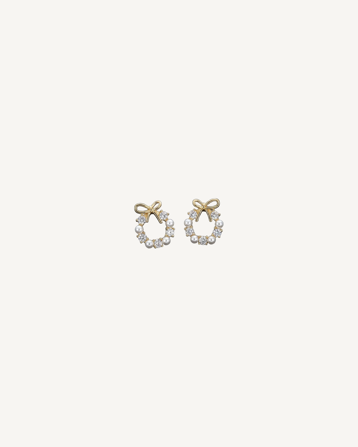 Pearl Bow Wreath Studs product image on Oyster Silk background