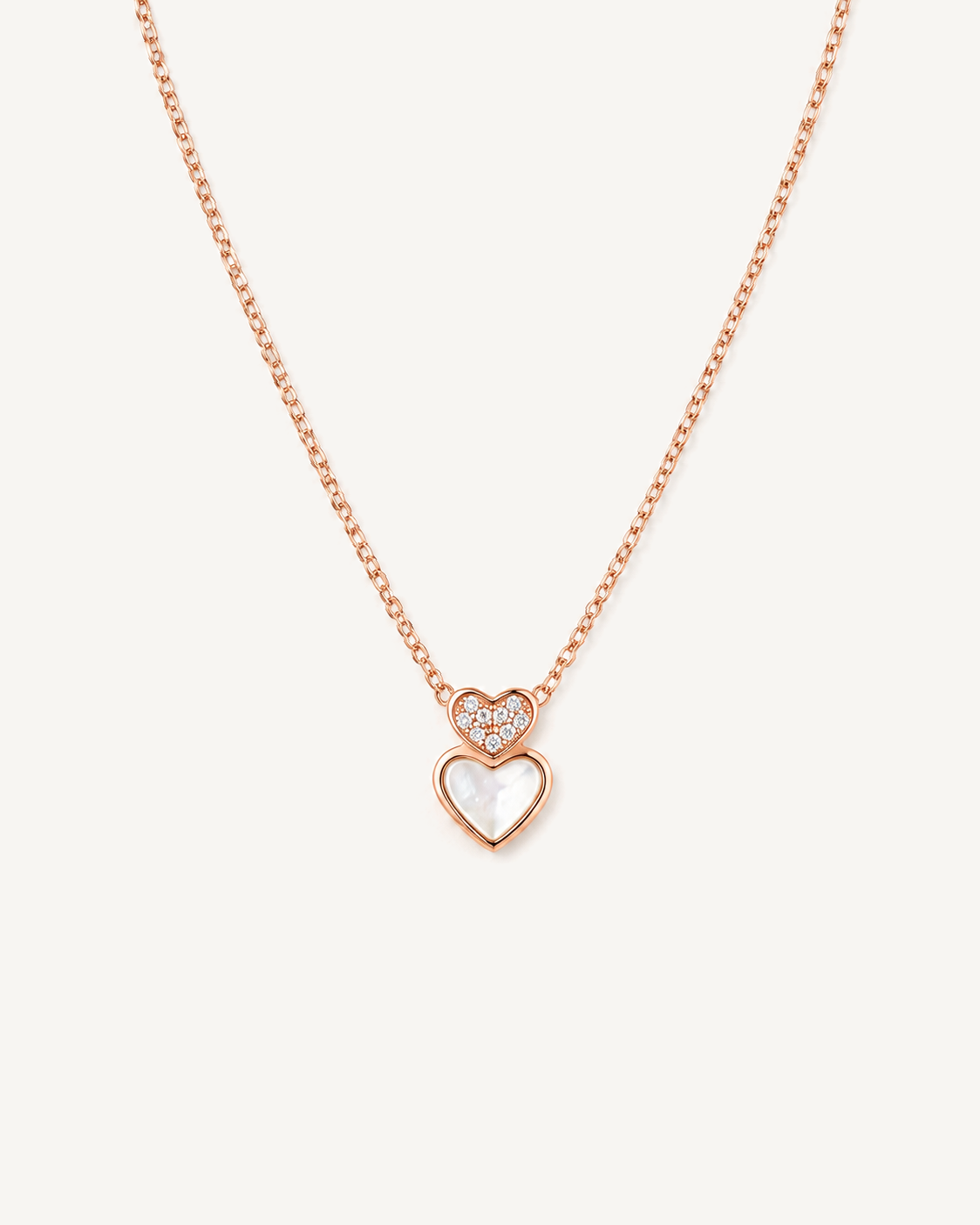 Double Heart Necklace product image on Oyster Silk background