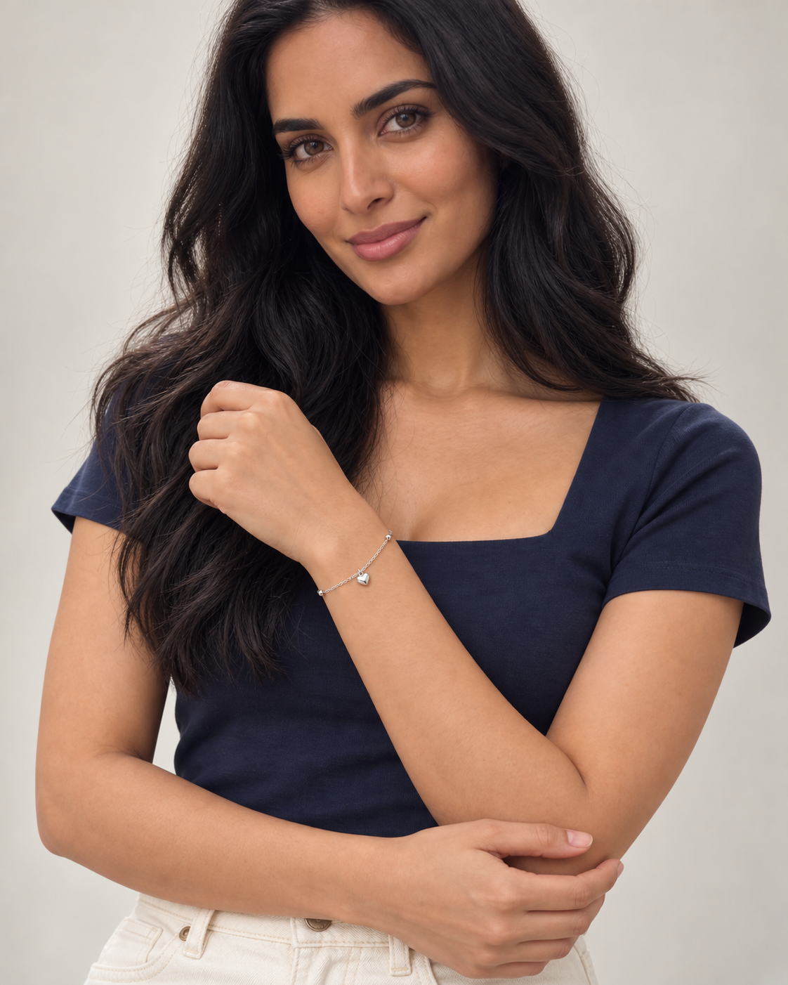 Puffed Heart Bracelet — worn studio view