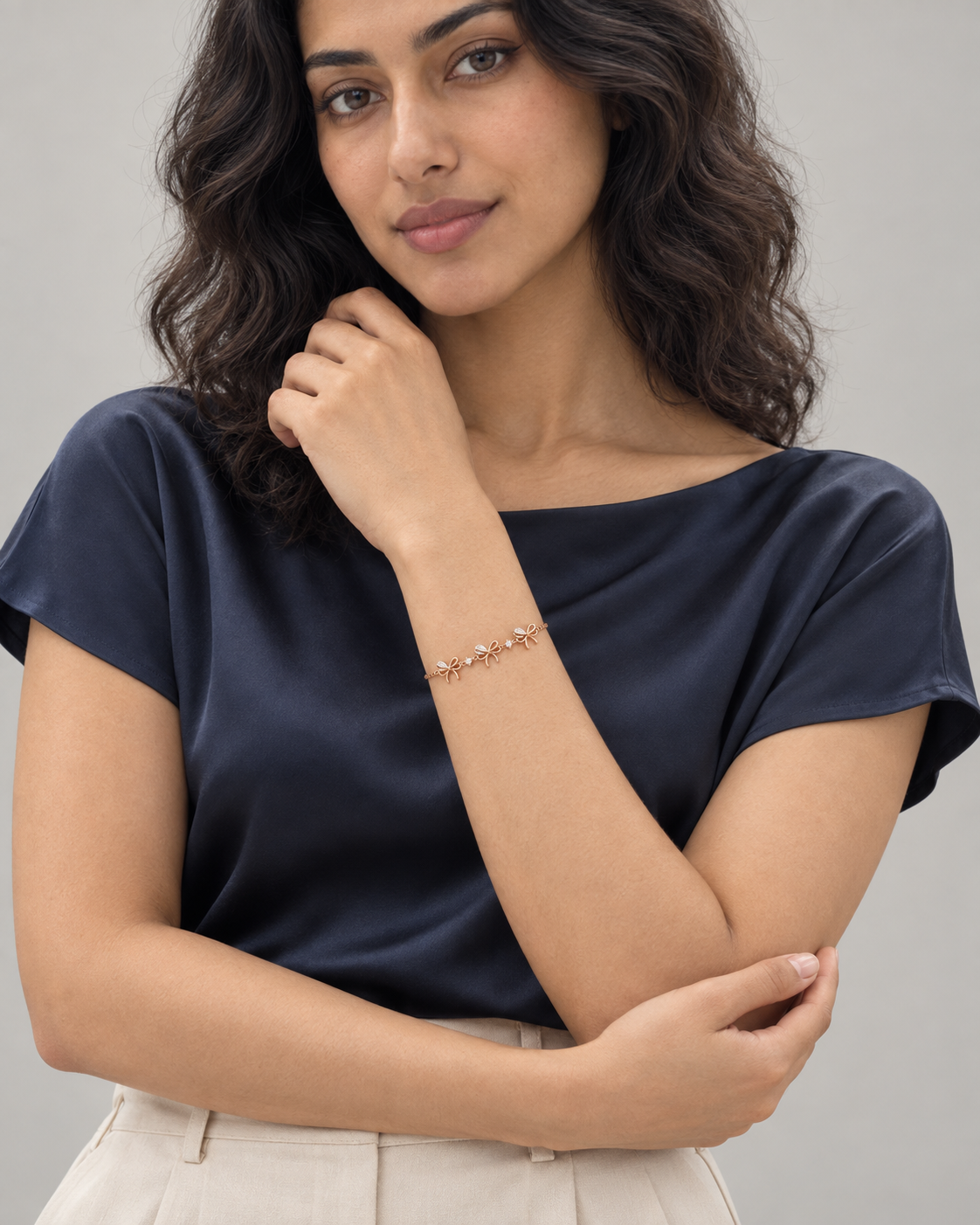 Bow Link Bracelet — worn studio view