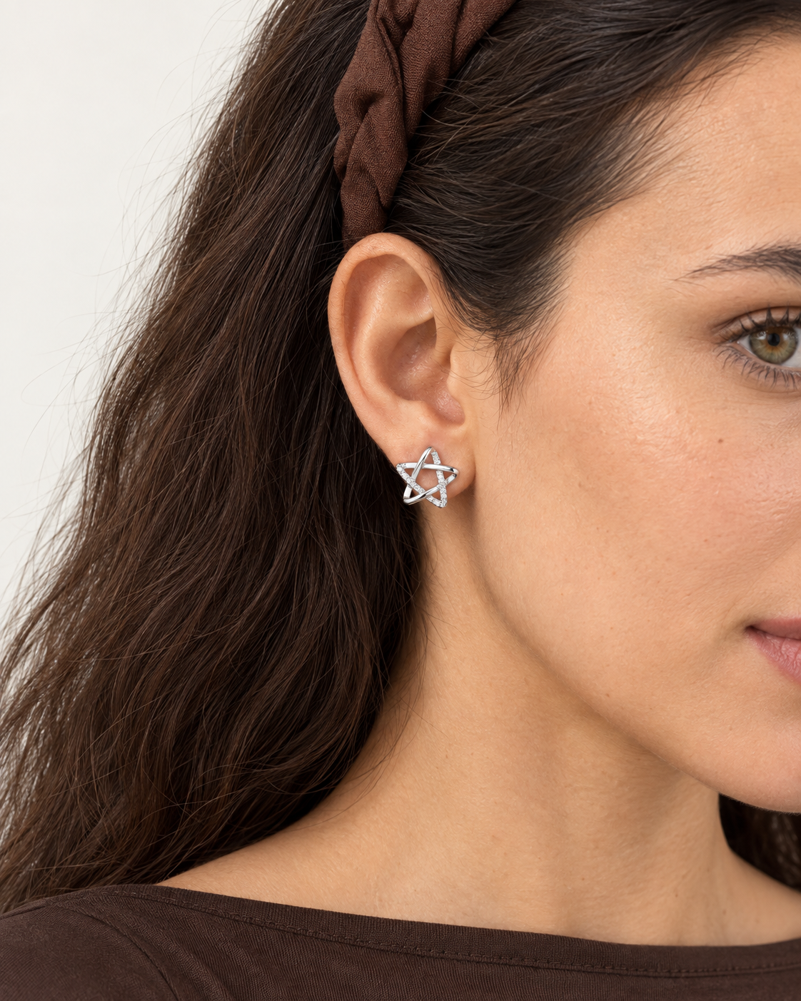 Interwoven Star Studs — worn close view