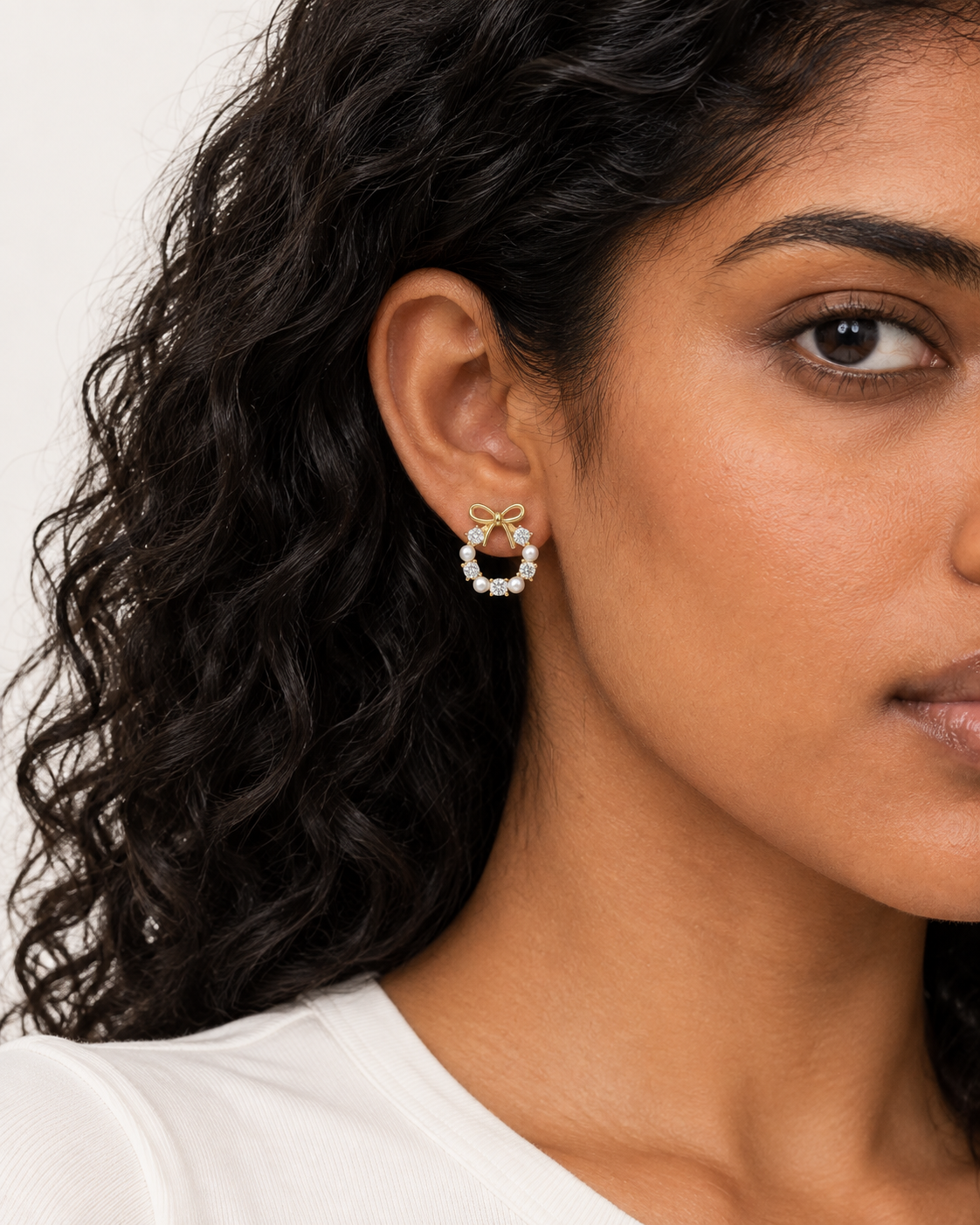 Pearl Bow Wreath Studs — worn close view