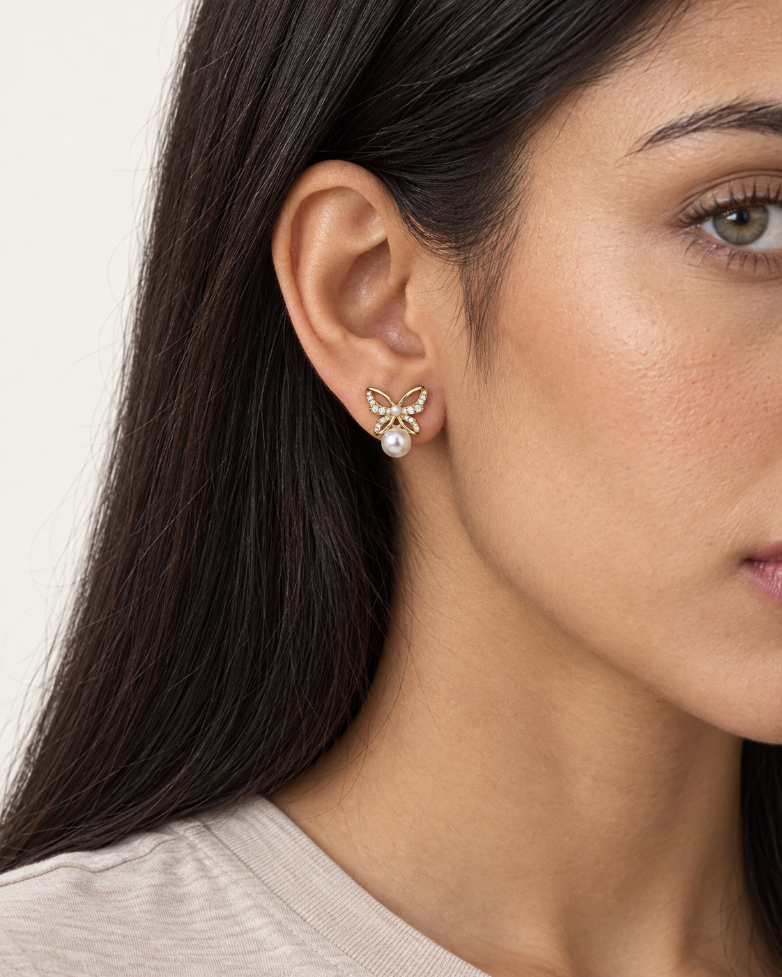 Pearl Butterfly Studs — worn close view
