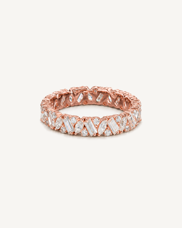 Mixed-Cut Band Ring in rose gold with baguette, marquise and round diamonds on Oyster Silk.