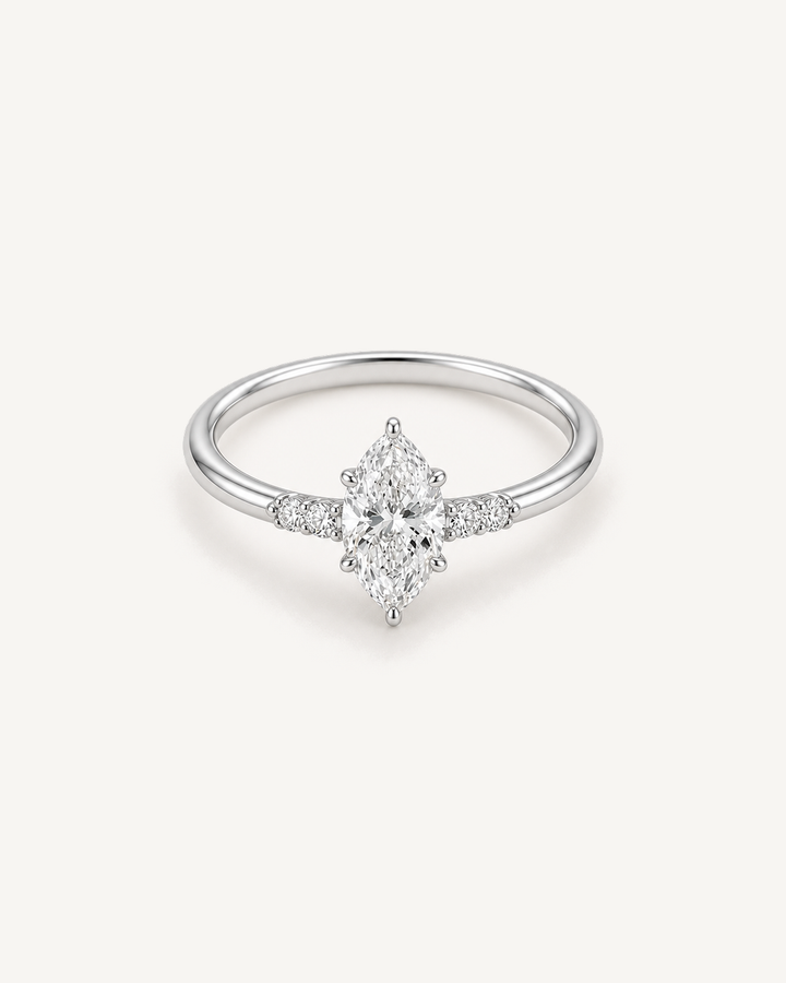 Three-Stone Marquise Ring product image on Oyster Silk background