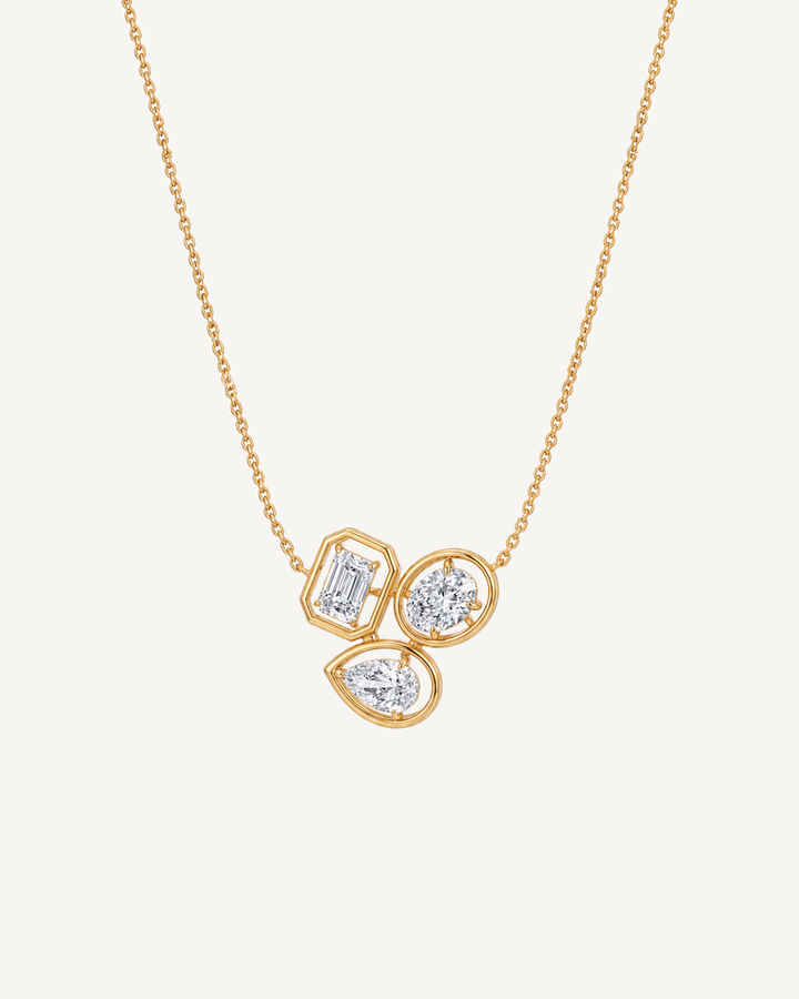 Triple Orbit Necklace product image on Oyster Silk background