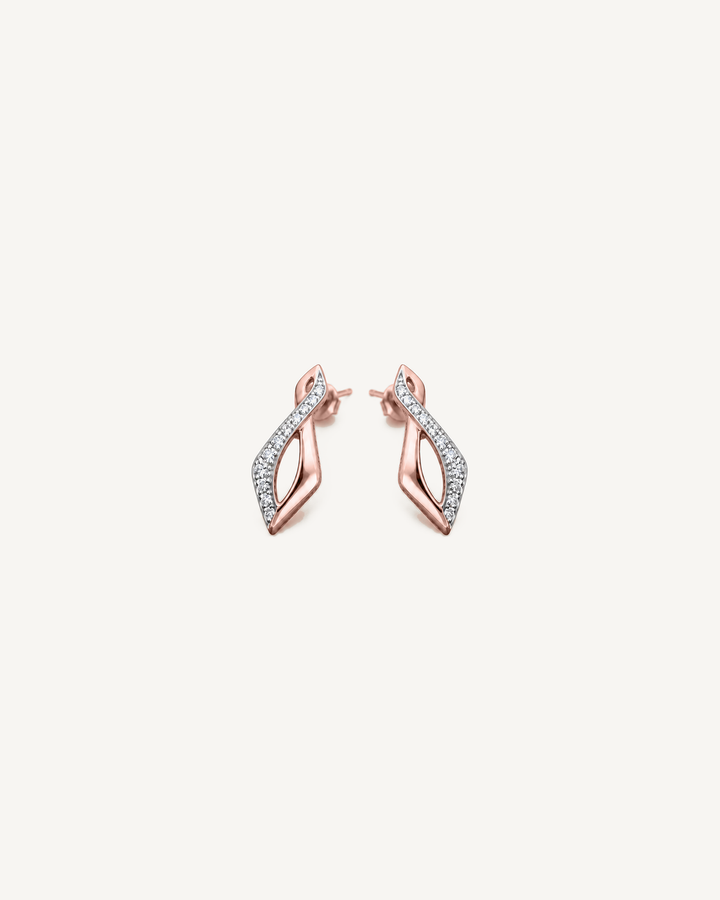 Twisted Leaf Studs in rose gold, mirrored pair at a three-quarter angle on Oyster Silk.
